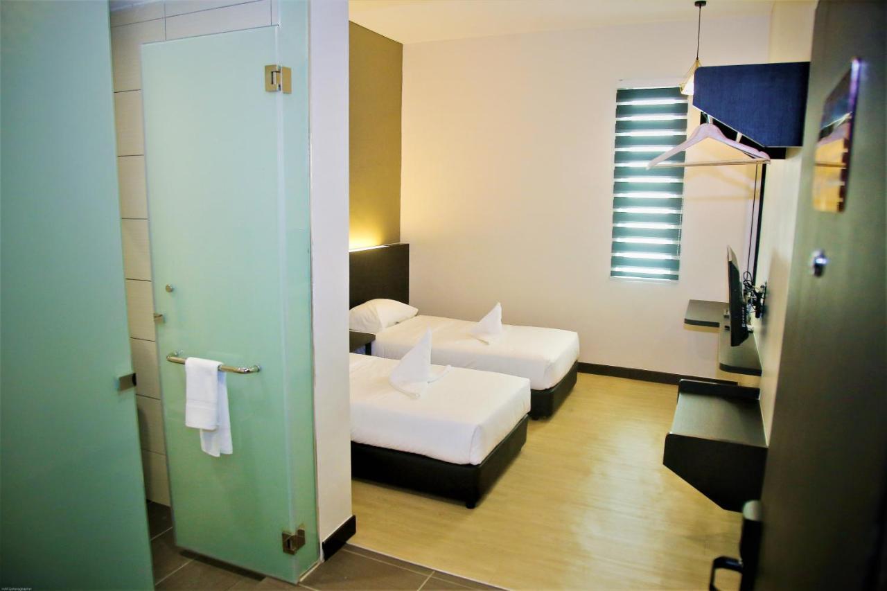 Padi Padi Hotel คันการ์ ภายนอก รูปภาพ
